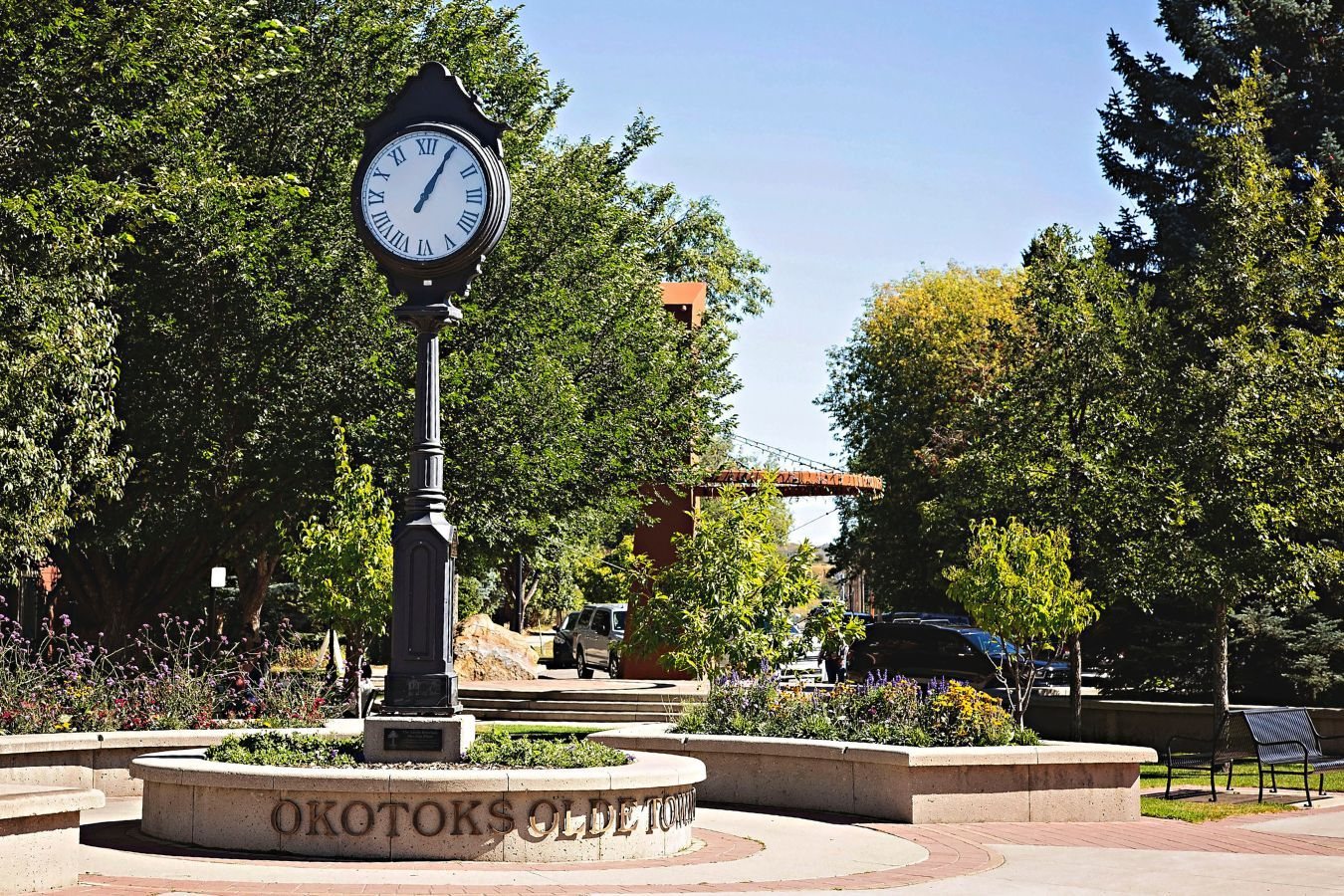 The Olde Towne Okotoks clock and gardens in historic downtown Okotoks