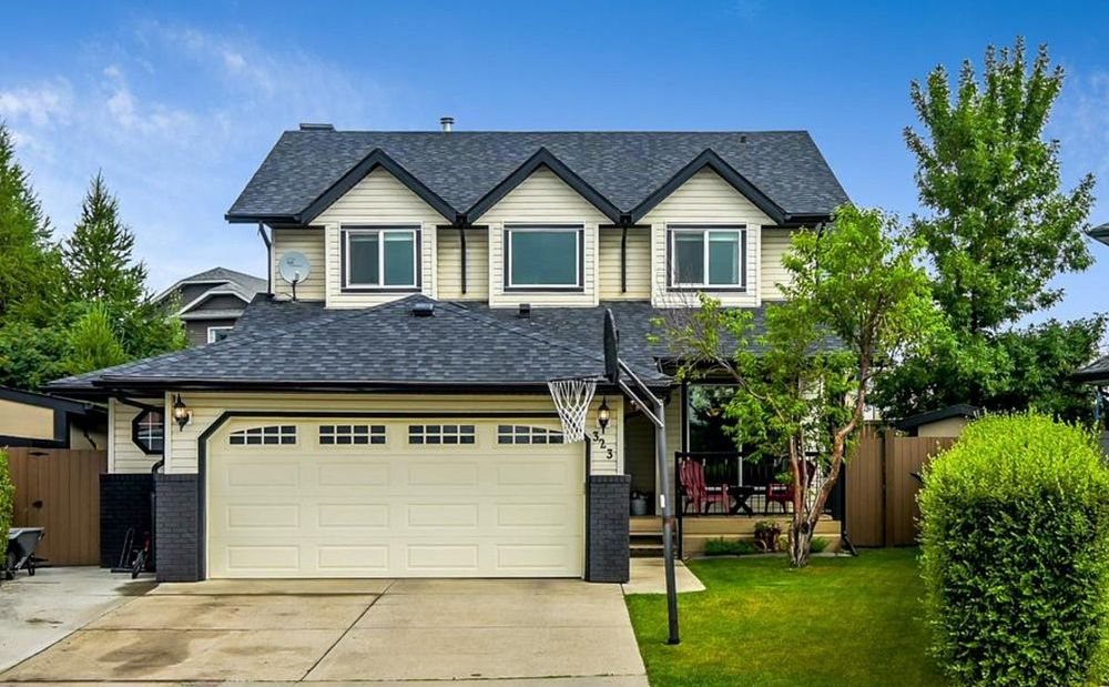 Two-storey home with mature landscaping in Suntree, Okotoks, sold by TJ Hart-Anderson